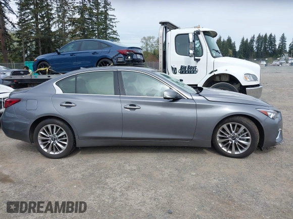 2021 Infiniti Q50 Luxe with VIN JN1EV7BR9MM755760, listed as a IAAI auction lot 41999322 with 60,978 mi miles and . Bid and sale history available at carsss.com. Image 13.