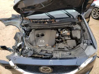 2019 Mazda CX-5 Grand Touring with VIN JM3KFADM0K1596256, listed as a Copart auction lot 86323594 with 118,853 mi miles and Salvage title. Bid and sale history available at DreamBid. Image 12.