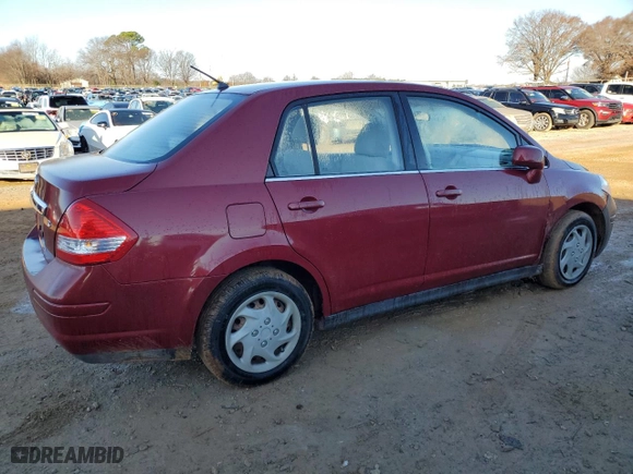 2007 Nissan Versa 1.8 S with VIN 3N1BC11E37L420609, listed as a Copart auction lot 85940874 with 112,342 mi miles and Salvage Title. Bid and sale history available at carsss.com. Image 3.