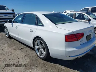 2013 Audi A8 L 3.0L with VIN WAURGAFD8DN033742, listed as a IAAI auction lot 41775363 with 101,610 mi miles. Bid and sale history available at carsss.com. Image 3.