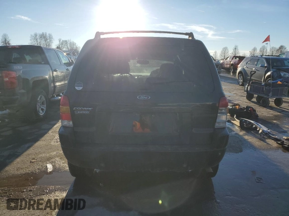 2004 Ford Escape Limited z VIN 1FMCU04184KA70257, wystawiony jako Copart lot #89130575 z przebiegiem 186 430 mil mil oraz Szkoda całkowita • Salvage title. Historia ofert i sprzedaży dostępna na DreamBid. Obrazek 6.