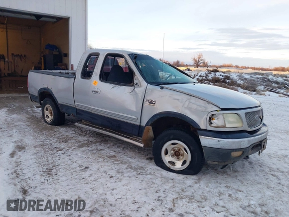 1999 Ford F-150 XL with VIN 1FTRX18LXXNA44916, listed as a IAAI auction lot 41322276 with 1 mi miles. Bid and sale history available at carsss.com. Image 1.
