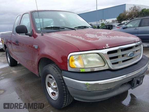 2003 Ford F-150 XL with VIN 1FTRX172X3NA92032, listed as a IAAI auction lot 41725879 with 1 mi miles. Bid and sale history available at carsss.com. Image 1.
