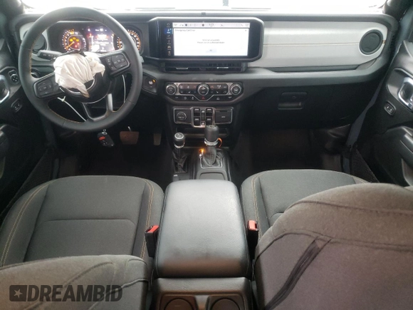 2024 Jeep Wrangler Sport S with VIN 1C4PJXDG1RW305304, listed as a Copart auction lot 57555635 with 5,705 mi miles and Salvage title. Bid and sale history available at DreamBid. Image 8.