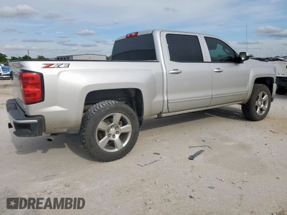 2018 Chevrolet Silverado 1500 LT with VIN 3GCUKREC3JG462083, listed as a Copart auction lot 56346705 with 166,454 mi miles and Clean Title. Bid and sale history available at DreamBid. Image 3.