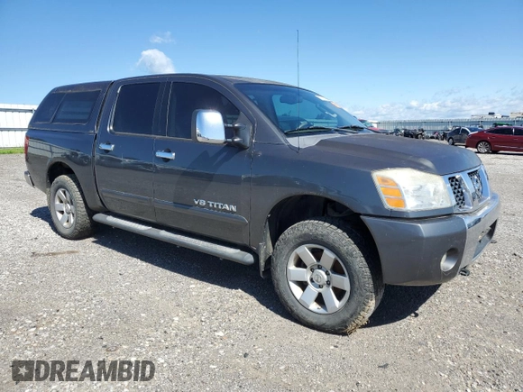2005 Nissan Titan LE with VIN 1N6BA07B95N571880, listed as a Copart auction lot 57527435 with 199,577 mi miles and Salvage title. Bid and sale history available at DreamBid. Image 4.