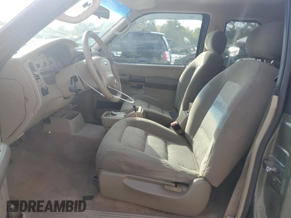 2003 Ford Explorer Sport XLS z VIN 1FMYU60EX3UA56154, wystawiony jako Copart lot #82259834 z przebiegiem 188 417 mil mil oraz Szkody całkowita. Historia ofert i sprzedaży dostępna na DreamBid. Obrazek 7.