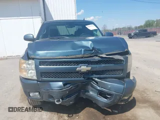 2009 Chevrolet Silverado 1500 LT with VIN 1GCEK29099Z214279, listed as a IAAI auction lot 42112324 with 55,953 mi miles and . Bid and sale history available at DreamBid. Image 6.
