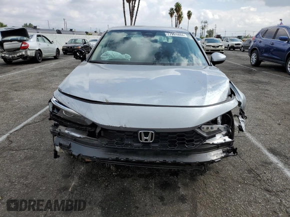 2025 Honda Civic Sedan LX with VIN 2HGFE2F28SH519958, listed as a Copart auction lot 77951444 with 8,157 mi miles and Salvage Title. Bid and sale history available at carsss.com. Image 5.