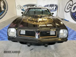 1975 Pontiac Firebird z VIN 2W87S5N561452, wystawiony jako Copart lot #64986614 z przebiegiem 73 434 mil mil oraz Tytuł czysty. Historia ofert i sprzedaży dostępna na DreamBid. Obrazek 5.