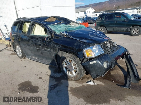 2007 GMC Envoy Denali with VIN 1GKET63M072227691, listed as a IAAI auction lot 41612371 with 154,001 mi miles. Bid and sale history available at carsss.com. Image 1.
