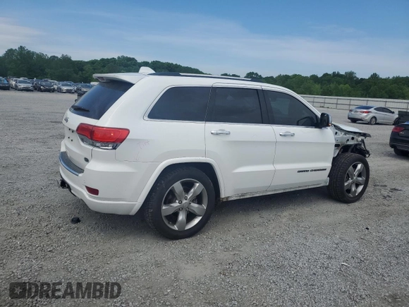 2017 Jeep Grand Cherokee Overland with VIN 1C4RJFCT7HC734125, listed as a Copart auction lot 54333215 with 101,229 mi miles and Salvage title. Bid and sale history available at DreamBid. Image 3.