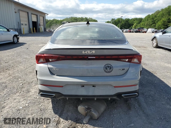 2022 Kia K5 GT-Line z VIN 5XXG64J22NG118741, wystawiony jako Copart lot #57244305 z przebiegiem Nie podano mil oraz Szkoda całkowita • Salvage title. Historia ofert i sprzedaży dostępna na DreamBid. Obrazek 6.