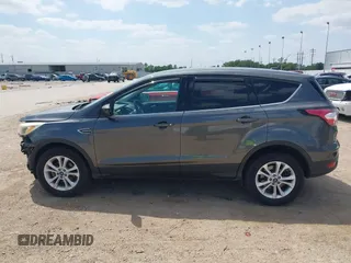 2017 Ford Escape SE z VIN 1FMCU0GD1HUE71410, wystawiony jako IAAI lot #42026516 z przebiegiem 173 804 mil mil oraz . Historia ofert i sprzedaży dostępna na DreamBid. Obrazek 15.