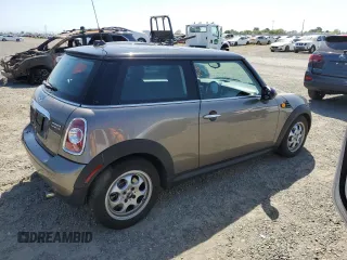 2013 MINI Hardtop with VIN WMWSU3C57DT678736, listed as a Copart auction lot 52586285 with 64,563 mi miles and Salvage Title. Bid and sale history available at DreamBid. Image 3.