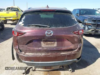 2019 Mazda CX-5 Sport with VIN JM3KFABM2K0686372, listed as a IAAI auction lot 41770183 with 57,202 mi miles and . Bid and sale history available at DreamBid. Image 16.