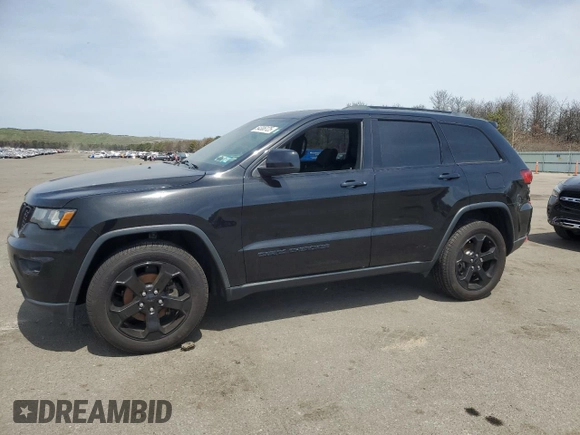 2018 Jeep Grand Cherokee Laredo E with VIN 1C4RJFAG5JC487392, listed as a Copart auction lot 54306125 with 183,666 mi miles and Clean Title. Bid and sale history available at carsss.com. Image 1.