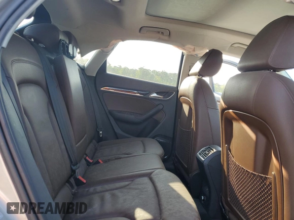 2016 Audi Q3 Prestige z VIN WA1GFCFS1GR009409, wystawiony jako Copart lot #52352845 z przebiegiem Nie podano mil oraz Szkody całkowita. Historia ofert i sprzedaży dostępna na DreamBid. Obrazek 12.