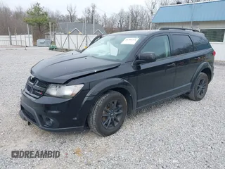 2019 Dodge Journey SE with VIN 3C4PDCBB7KT844691, listed as a IAAI auction lot 41784711 with 107,000 mi miles and . Bid and sale history available at DreamBid. Image 2.