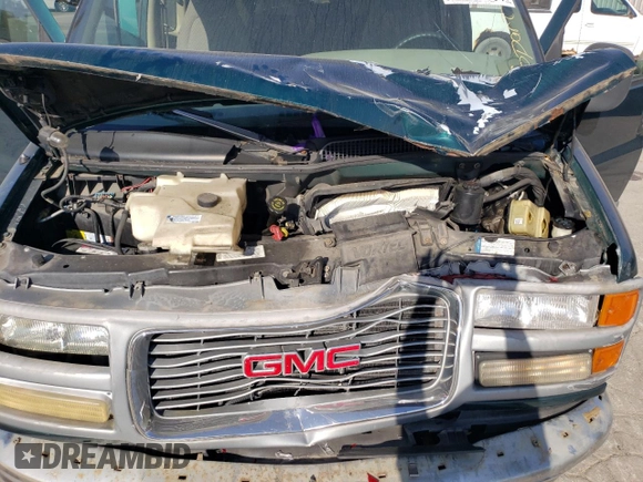1997 GMC Savana z VIN 1GJGG25R1V1073885, wystawiony jako Copart lot #72458594 z przebiegiem 189 209 mil mil oraz Szkoda całkowita • Salvage title. Historia ofert i sprzedaży dostępna na DreamBid. Obrazek 13.