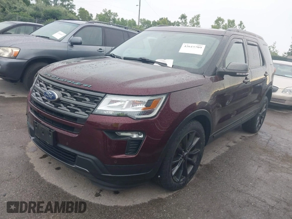 2018 Ford Explorer XLT z VIN 1FM5K8D87JGC67946, wystawiony jako IAAI lot #42615709 z przebiegiem 39 872 mil mil oraz . Historia ofert i sprzedaży dostępna na DreamBid. Obrazek 2.