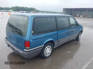 1992 Dodge Grand Caravan z VIN 1B4GH54R6NX218758, wystawiony jako IAAI lot #42362782 z przebiegiem 172 142 mil mil oraz . Historia ofert i sprzedaży dostępna na DreamBid. Obrazek 4.