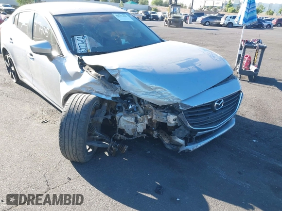 2017 Mazda 3 Touring with VIN JM1BN1V72H1106185, listed as a IAAI auction lot 42697405 with 110,324 mi miles and . Bid and sale history available at DreamBid. Image 6.