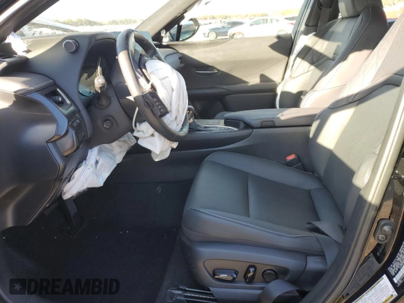2023 Lexus UX 250h Premium с VIN JTHP9JBH8P2069805, выставлен на аукционе Copart как лот 87671095 с пробегом 12 599 миль миль и Списание • Salvage title. История ставок и продаж доступна на DreamBid. Изображение 7.