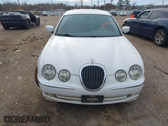 2002 Jaguar S-Type with VIN SAJDA01P12GM35163, listed as a IAAI auction lot 41097415 with 114,017 mi miles and . Bid and sale history available at DreamBid. Image 6.