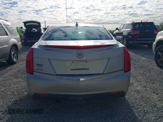 2014 Cadillac ATS Standard RWD z VIN 1G6AA5RA0E0103116, wystawiony jako IAAI lot #42116348 z przebiegiem 133 956 mil mil oraz . Historia ofert i sprzedaży dostępna na DreamBid. Obrazek 17.