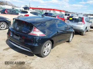 2011 Honda CR-Z EX with VIN JHMZF1D68BS004880, listed as a IAAI auction lot 41890806 with 129,204 mi miles and . Bid and sale history available at DreamBid. Image 4.