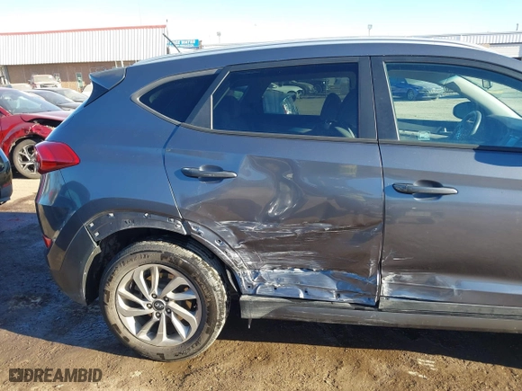 2016 Hyundai Tucson SE with VIN KM8J33A45GU089996, listed as a IAAI auction lot 41687069 with 129,957 mi miles. Bid and sale history available at carsss.com. Image 6.