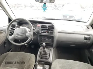 2004 Suzuki Vitara z VIN 2S3TD62VX46100019, wystawiony jako Copart lot #74291684 z przebiegiem 148 566 mil mil oraz Szkody całkowita. Historia ofert i sprzedaży dostępna na DreamBid. Obrazek 8.