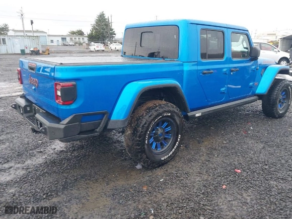 2022 Jeep Gladiator Rubicon with VIN 1C6JJTBM8NL144962, listed as a IAAI auction lot 41037201 with 12,063 mi miles. Bid and sale history available at carsss.com. Image 4.
