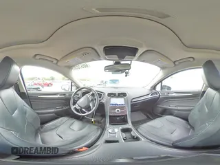 2020 Ford Fusion Titanium with VIN 3FA6P0D96LR175863, listed as a Copart auction lot 60570305 with 76,064 mi miles and Salvage title. Bid and sale history available at DreamBid. Image 14.