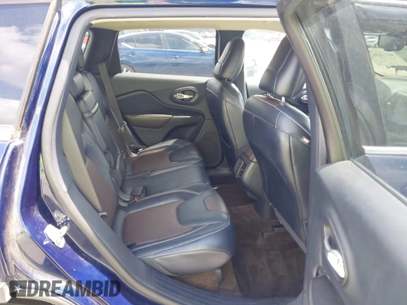 2015 Jeep Cherokee Limited with VIN 1C4PJLDS0FW602525, listed as a IAAI auction lot 42114915 with 194,530 mi miles and . Bid and sale history available at DreamBid. Image 8.