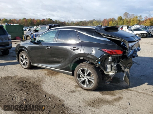 2023 Lexus RX with VIN 2T2BAMCA2PC013409, listed as a Copart auction lot 71721004 with 10,615 mi miles and Salvage Title. Bid and sale history available at carsss.com. Image 2.