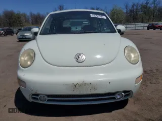 2002 Volkswagen Beetle GLS z VIN 3VWCK21C42M457645, wystawiony jako Copart lot #55900935 z przebiegiem 112 836 mil mil oraz Czysty tytuł • Clean title. Historia ofert i sprzedaży dostępna na DreamBid. Obrazek 5.