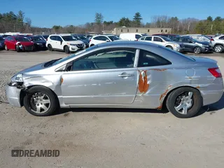 2006 Honda Civic Cpe LX with VIN 2HGFG11666H546449, listed as a IAAI auction lot 41840933 with 155,649 mi miles. Bid and sale history available at carsss.com. Image 6.