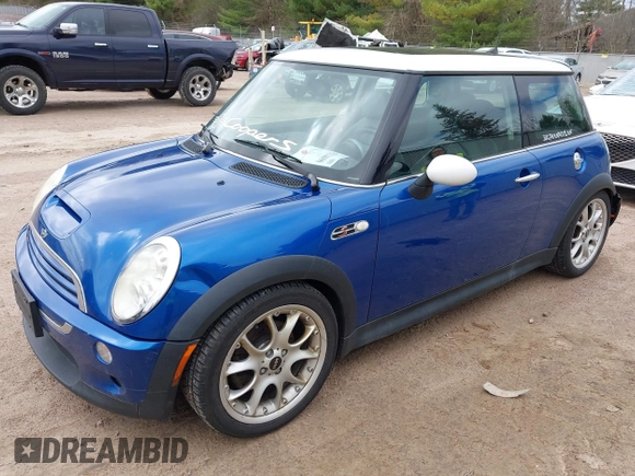 2006 MINI Hardtop S with VIN WMWRE33516TL22491, listed as a IAAI auction lot 42134690 with 163,912 mi miles and . Bid and sale history available at DreamBid. Image 2.