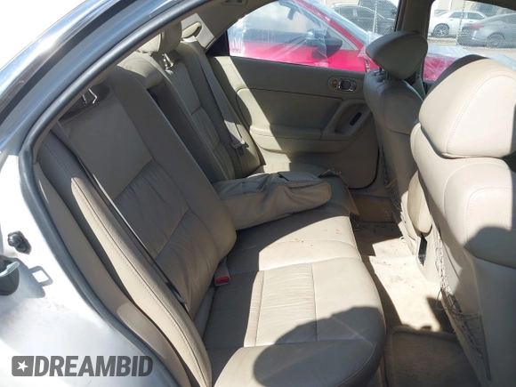 2002 Mazda Millenia S with VIN JM1TA222821725749, listed as a IAAI auction lot 41662948 with 165,088 mi miles and . Bid and sale history available at DreamBid. Image 8.