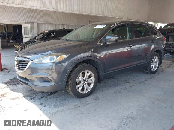 2013 Mazda CX-9 Sport with VIN JM3TB2BAXD0407958, listed as a IAAI auction lot 42346949 with 132,855 mi miles and . Bid and sale history available at DreamBid. Image 2.