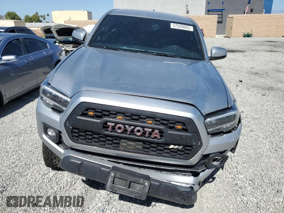 2023 Toyota Tacoma SR with VIN 3TMCZ5AN8PM545588, listed as a Copart auction lot 57528655 with 73,286 mi miles and Salvage title. Bid and sale history available at DreamBid. Image 5.
