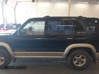 2001 Isuzu Trooper S with VIN JACDJ58X917J09299, listed as a IAAI auction lot 41296724 with 131,829 mi miles and . Bid and sale history available at DreamBid. Image 14.