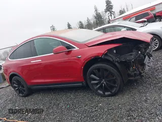 2019 Tesla Model X 75D with VIN 5YJXCBE23KF207739, listed as a IAAI auction lot 41808567 with 191,233 mi miles and . Bid and sale history available at DreamBid. Image 14.