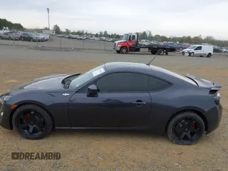 2014 Scion FR-S with VIN JF1ZNAA12E8702261, listed as a IAAI auction lot 41971045 with 124,341 mi miles and . Bid and sale history available at DreamBid. Image 14.