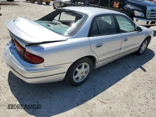 2002 Buick Regal LS z VIN 2G4WB55KX21144458, wystawiony jako Copart lot #54374445 z przebiegiem 97 900 mil mil oraz Czysty tytuł • Clean title. Historia ofert i sprzedaży dostępna na DreamBid. Obrazek 3.