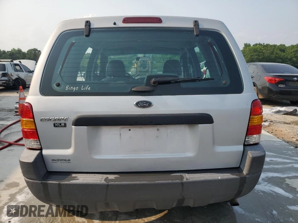 2002 Ford Escape XLS Choice z VIN 1FMYU01102KB13125, wystawiony jako Copart lot #59034495 z przebiegiem 202 253 mil mil oraz Szkoda całkowita • Salvage title. Historia ofert i sprzedaży dostępna na DreamBid. Obrazek 6.