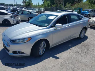 2016 Ford Fusion SE with VIN 3FA6P0T90GR374060, listed as a IAAI auction lot 42037332 with 145,676 mi miles. Bid and sale history available at carsss.com. Image 2.