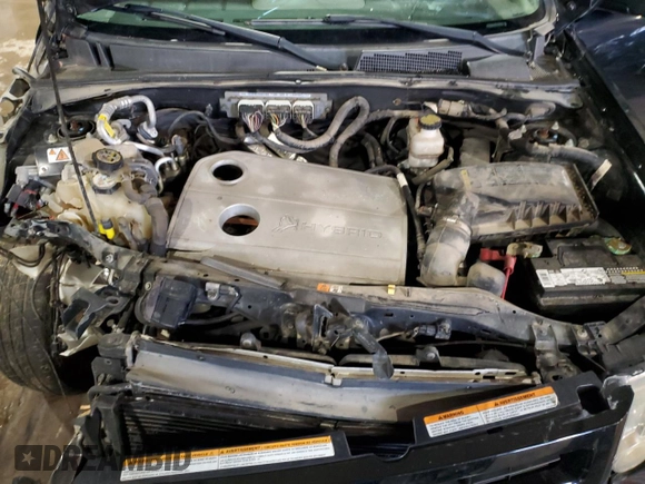 2010 Ford Escape Hybrid with VIN 1FMCU4K39AKB81388, listed as a Copart auction lot 48422145 with 227,429 mi miles and Salvage title. Bid and sale history available at DreamBid. Image 12.